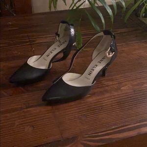 Black snake print faux leather heels